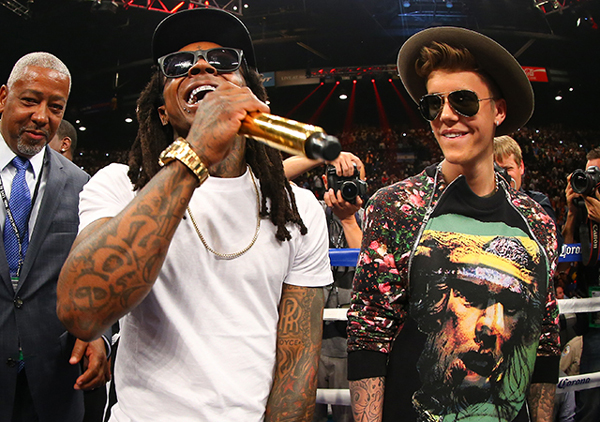 PHOTOS: Justin Bieber & Lil Wayne help Floyd Mayweather make entrance